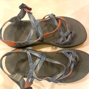 Great condition Chacos faint red/salmon color with cool blue patterns